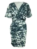 Celine Pre-Owned abstract-print wrap mini dress - Green