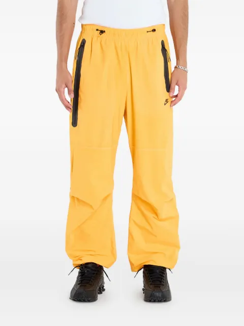 Nike pantalones con bolsillos y cierre