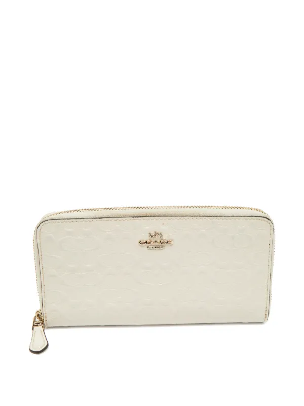 Coach Vintage Embossed patent-leather Zip Wallet | White | FARFETCH