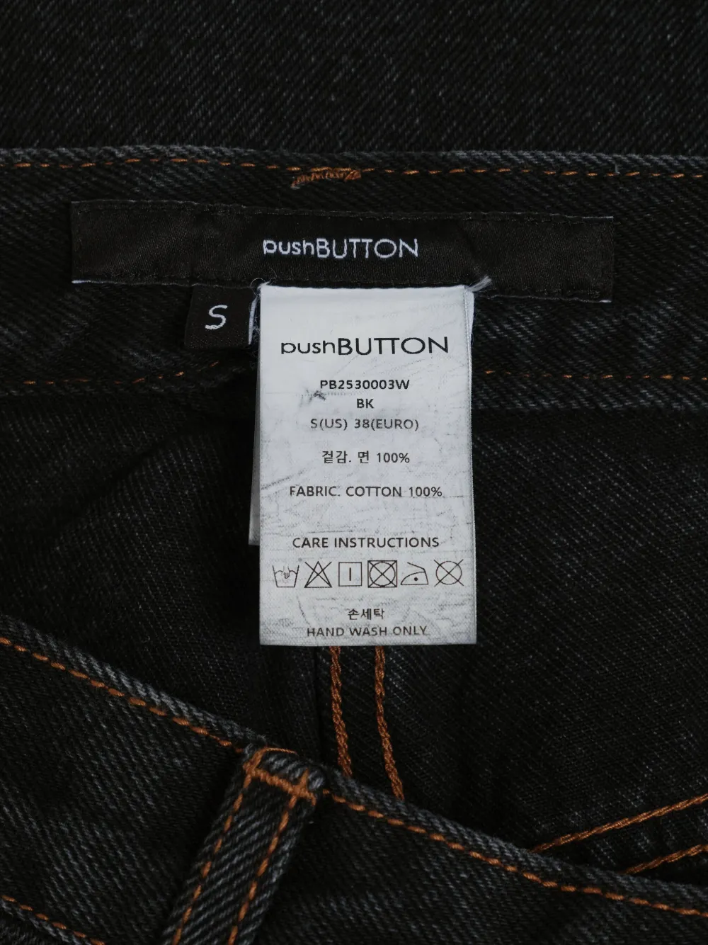 Pushbutton Illustration-appliqué Tapered Jeans In Black