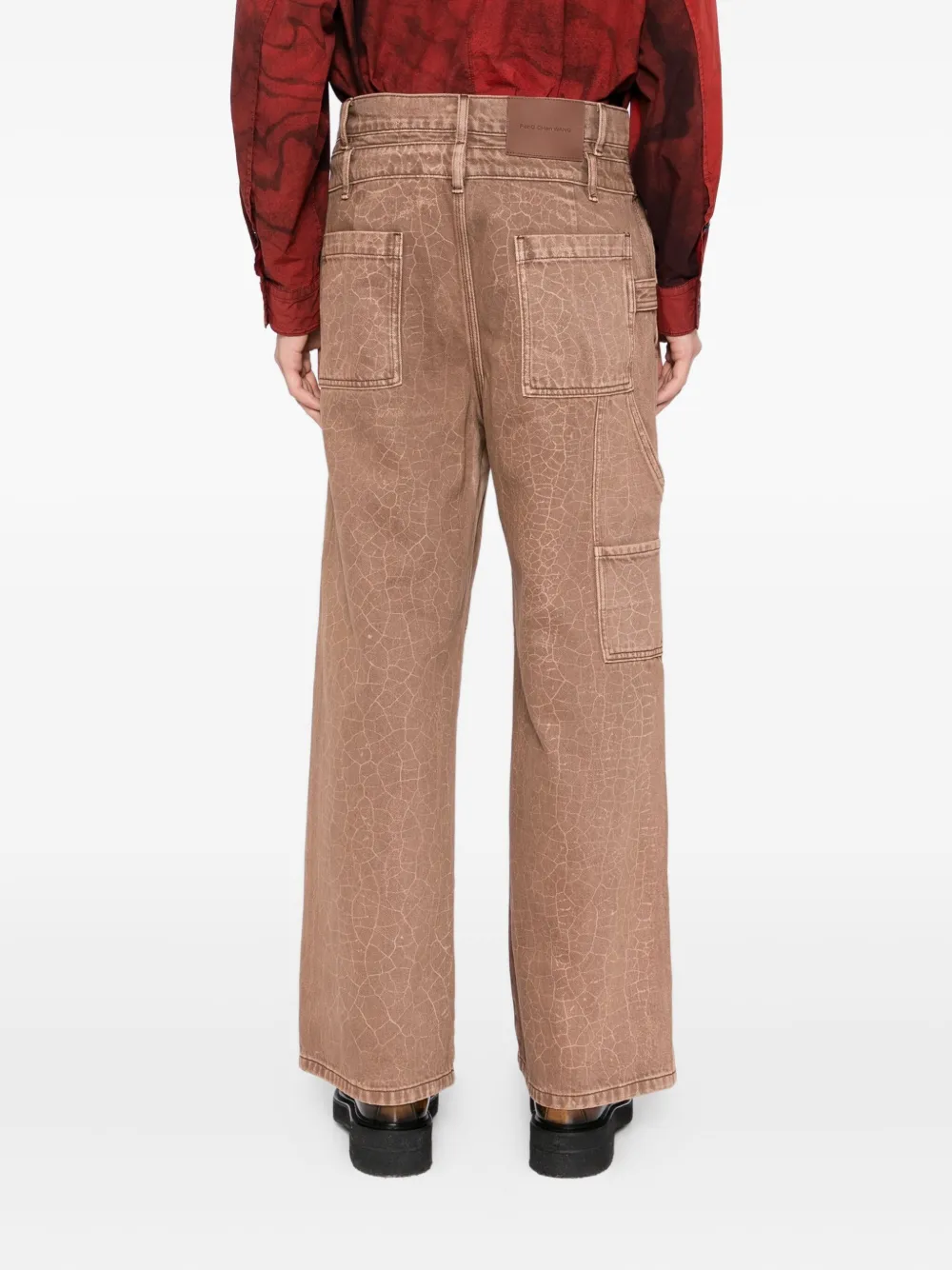 Feng Chen Wang Jeans met gebarsten print Bruin