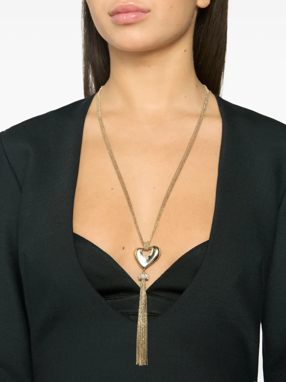 Genny Halsketting met hart en kwastje hanger - Goud