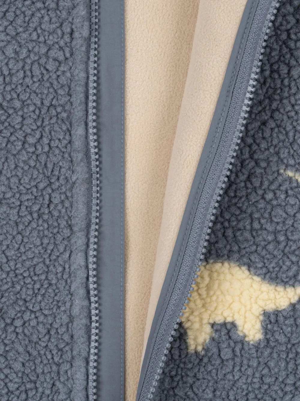 Konges Sløjd Jody jack met dinosaurus en rits Blauw