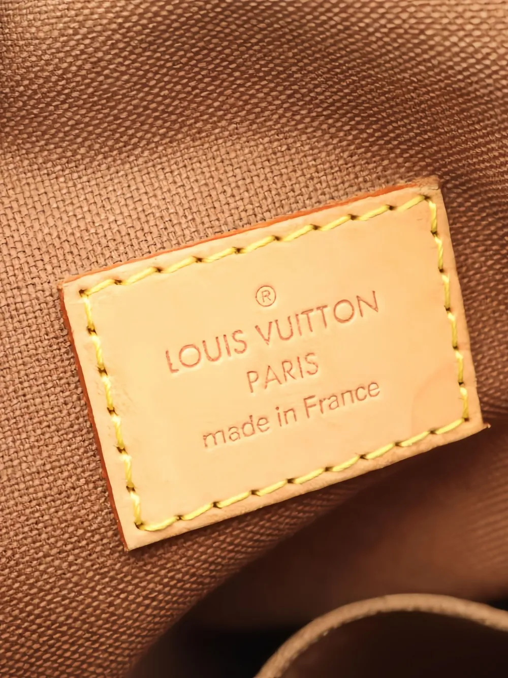 Pre-owned Louis Vuitton Lockit Monogram Handbag In Brown