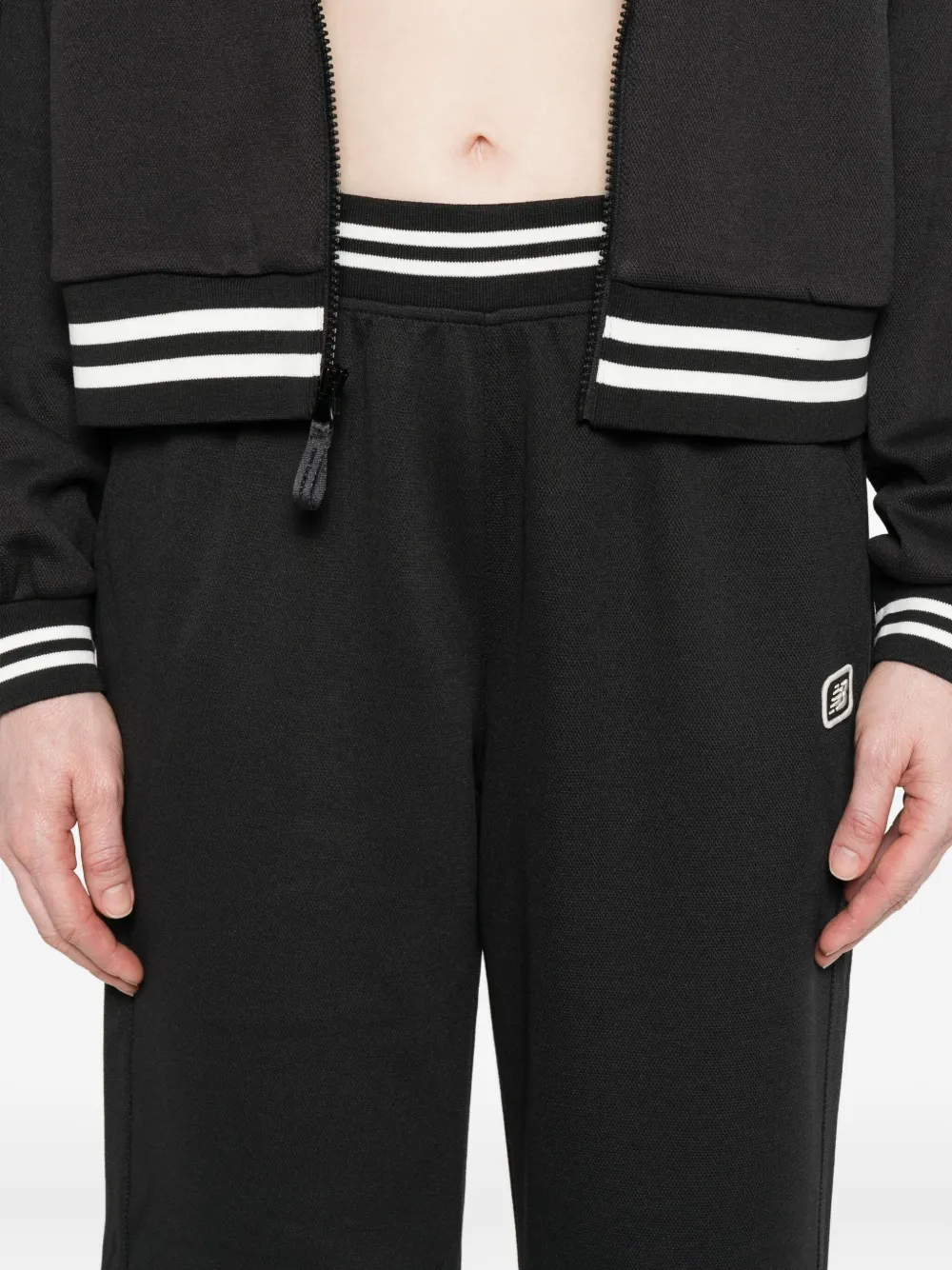 New Balance Elasticated-waistband Split-hem Trousers In Black