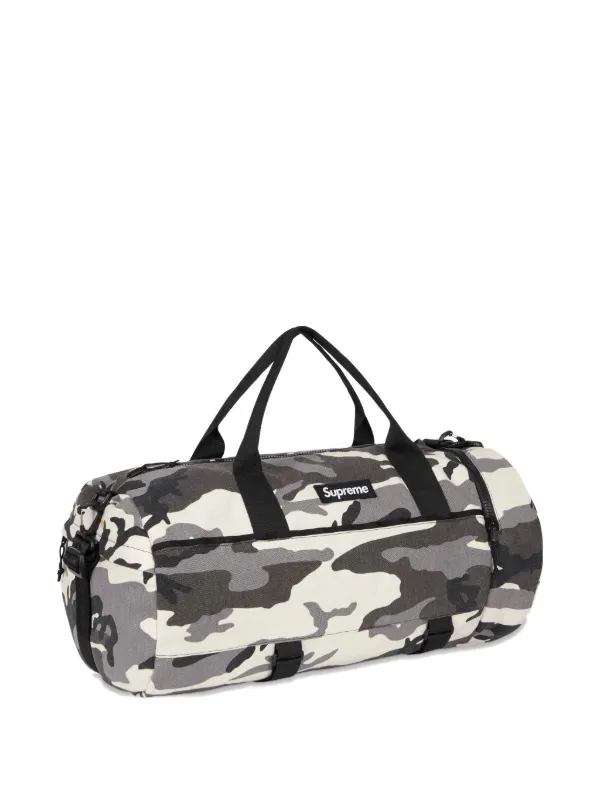 Supreme camo-print Duffle Bag | Black | FARFETCH