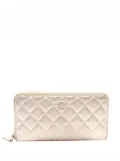 CHANEL Pre-Owned 2014 CC Quilted Metallic Lambskin Zip Around Wallet long wallets - Gold