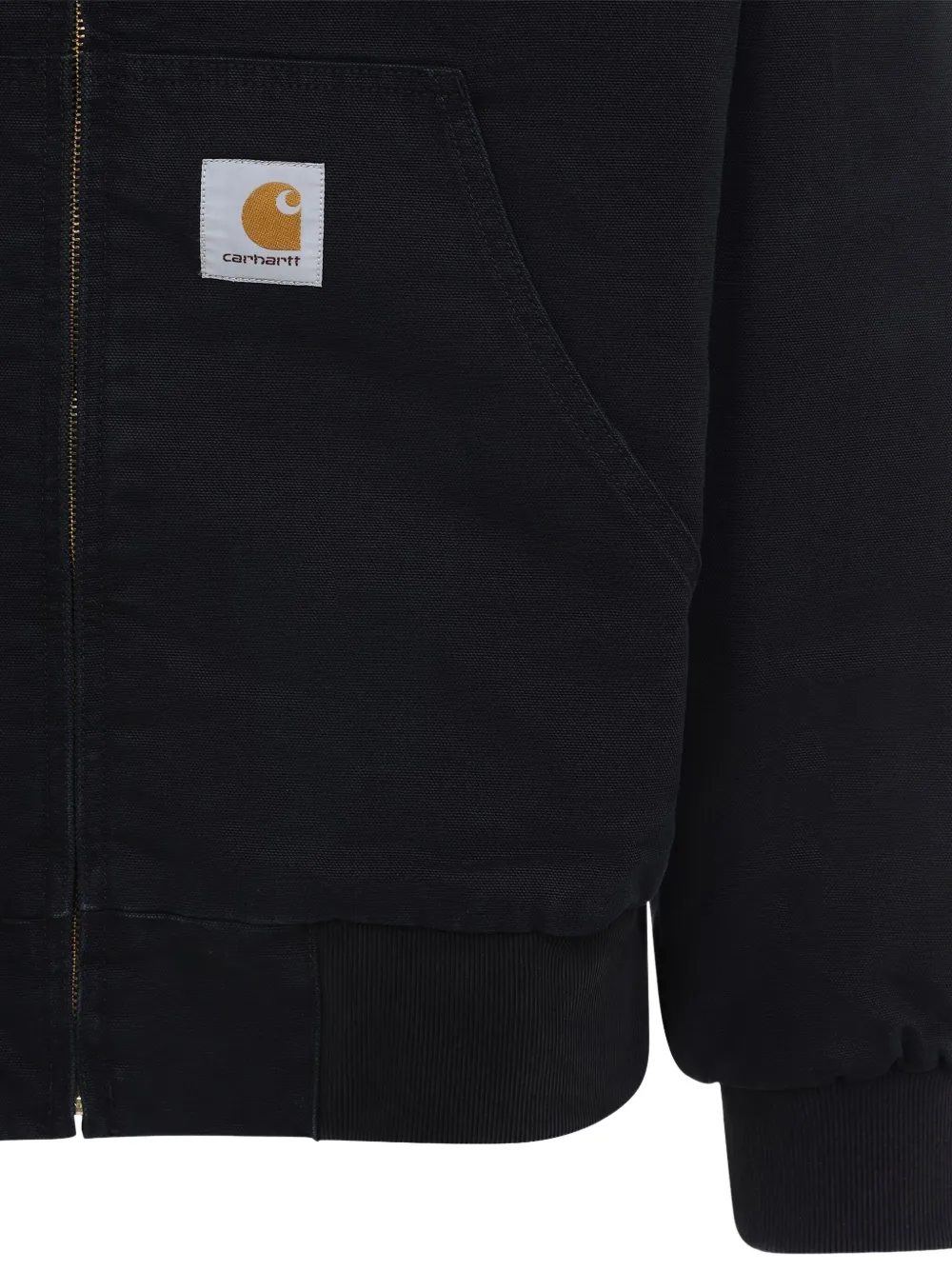 Carhartt Hooded Jacket With Pockets And Ribbed Finish In Black