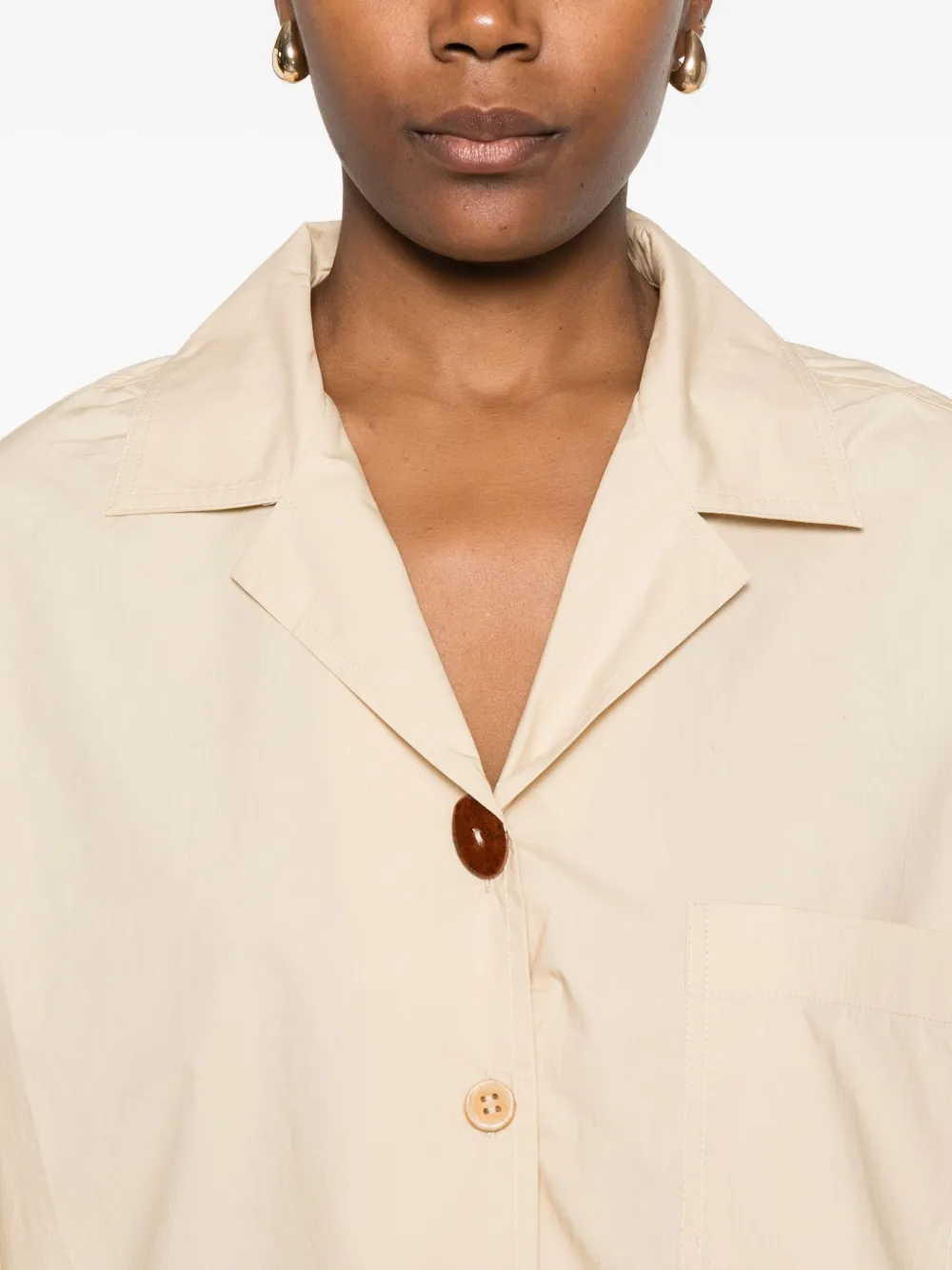 Nanushka blouse met opgestikte zak Beige