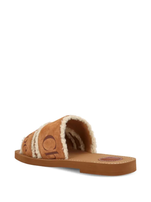 Chloé Woody logo-embellished Shearling Sandals | Brown | FARFETCH