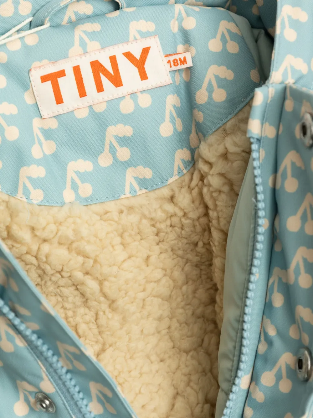Tiny Cottons Gewatteerde romper met kersenprint Grijs