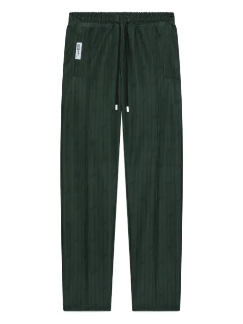 GCDS pantalones con rayas diplomáticas estampadas