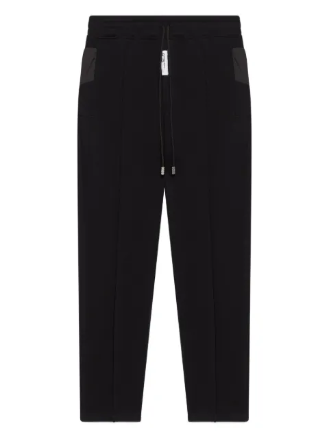GCDS pants con cordones y paneles