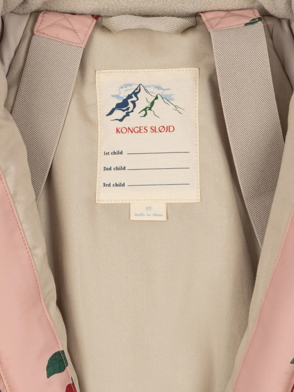 Konges Sløjd Award skipak met kersenprint en capuchon Roze