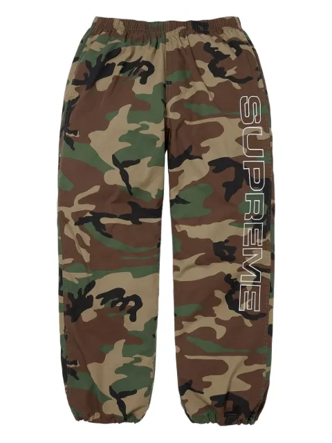 Supreme Spellout camouflage ripstop track pants
