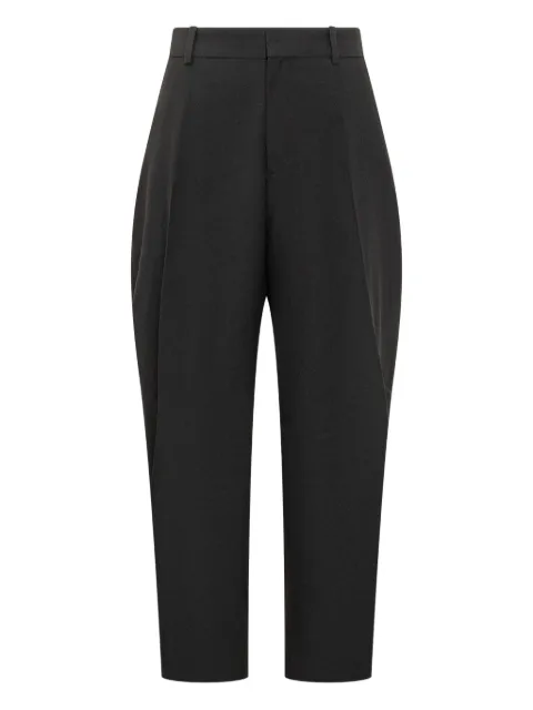 Studio Nicholson curved full-length trousers