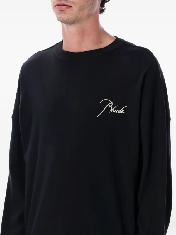 low-rise "Black Wash Blowout" slim jeans