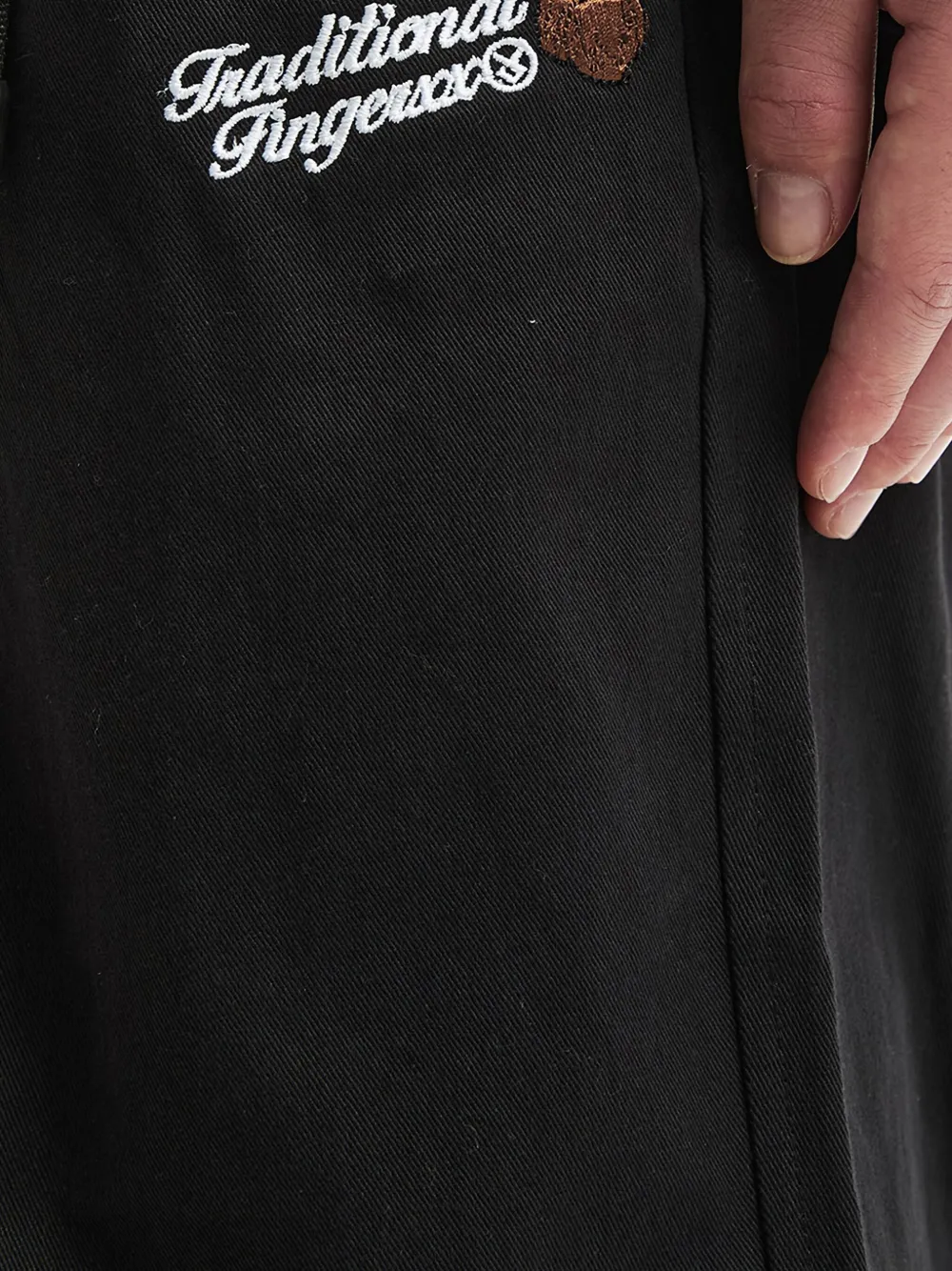 Fingercroxx Logo Belt Trousers In Black