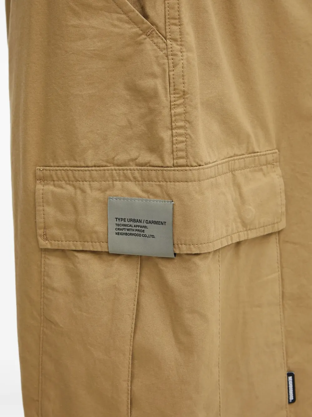 Neighborhood Shorts met cargo zak Beige
