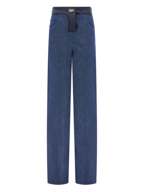 Ferragamo jeans con cinco bolsillos y ribete de cuero