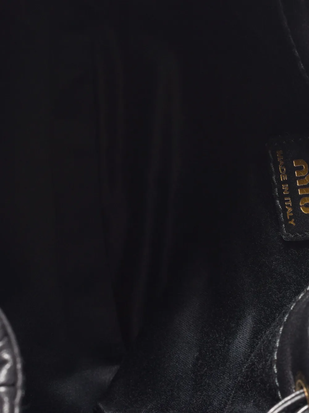 Miu Matelassé clutch met trekkoord Zwart