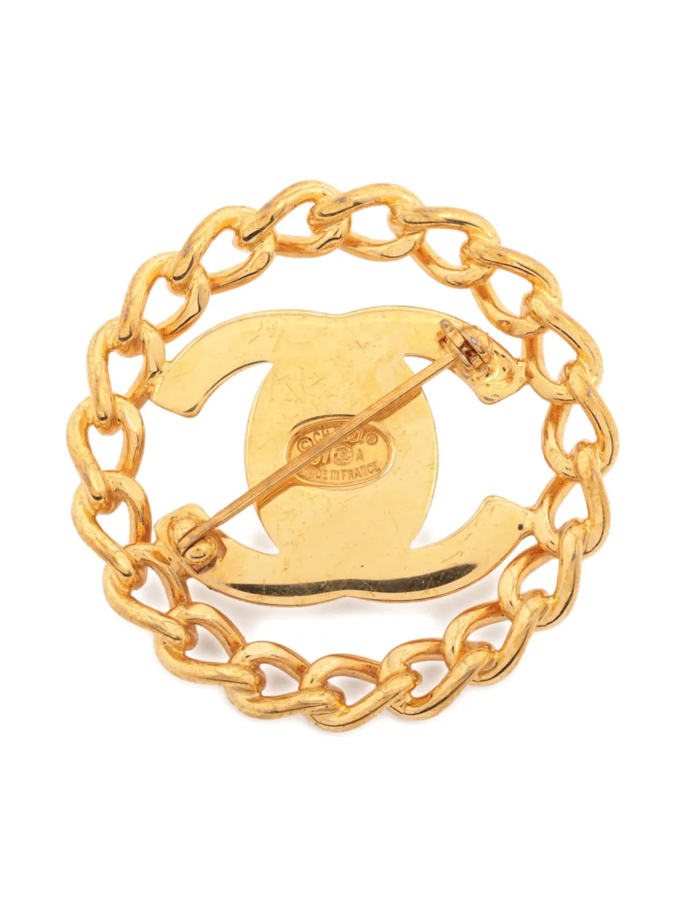 CHANEL Pre-Owned CC turn-lock brooch - ゴールドトーン CHANEL Pre-Owned CC turn-lock brooch - ゴールドトーン