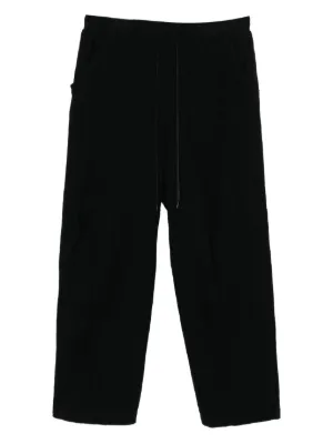 Black Comme Des Garçons ダメージパンツ | ブラック | FARFETCH JP