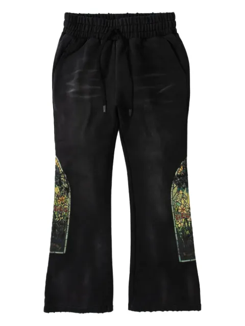 Who Decides War faded track pants