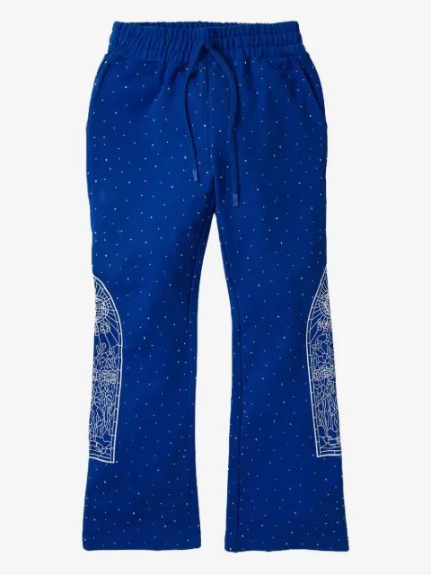 Who Decides War pants con detalles de strass