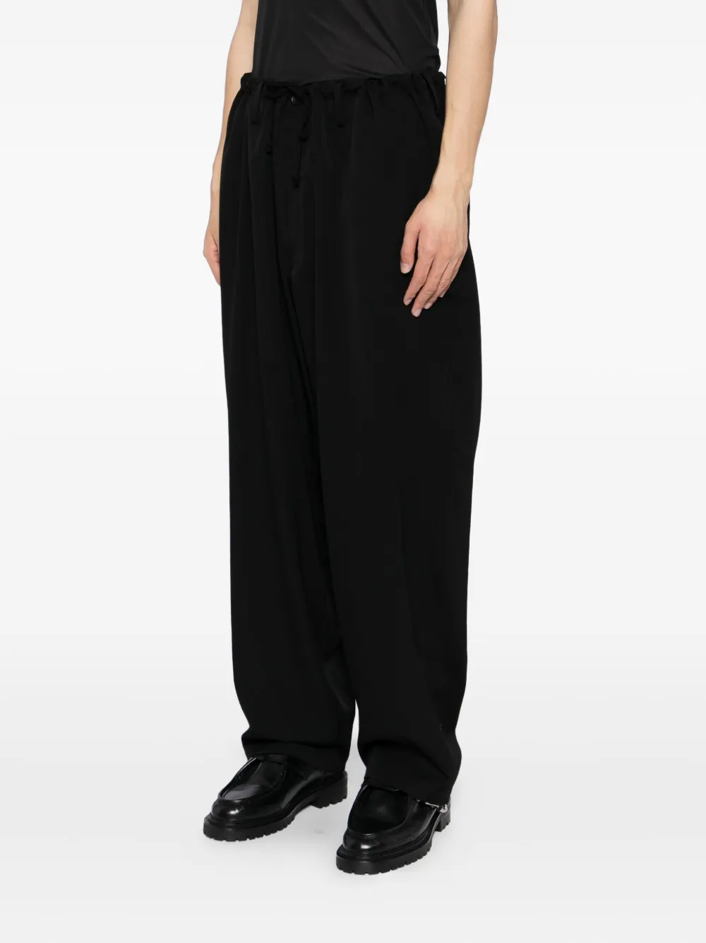 Yohji Yamamoto Broek met toelopende pijpen Zwart