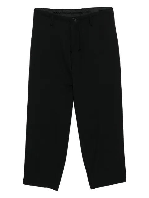 Yohji Yamamoto pantalones ajustados con cordones en la pretina