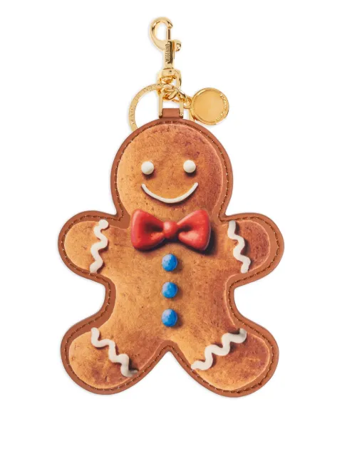 Moschino llavero con dije de hombre de jengibre