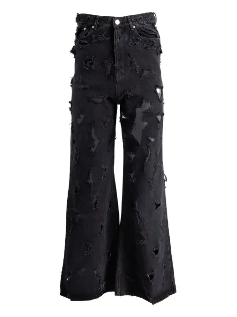 Matières Fécales jeans con efecto envejecido