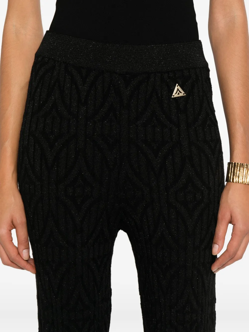 Akep Textured Logo Trousers In Black