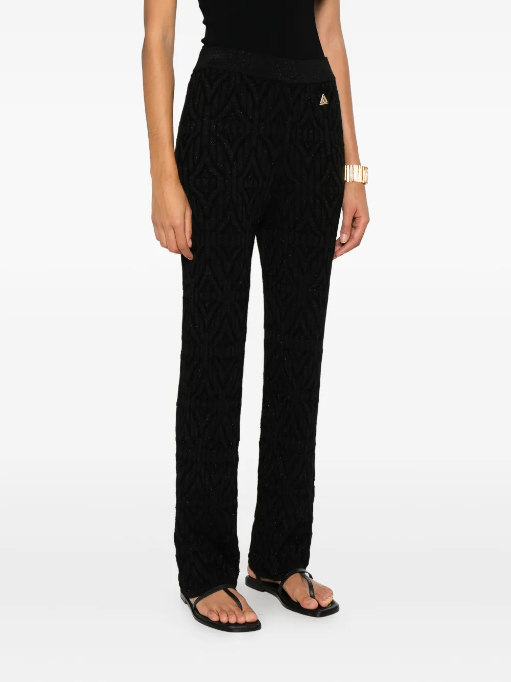 Akep Textured Logo Trousers In Black