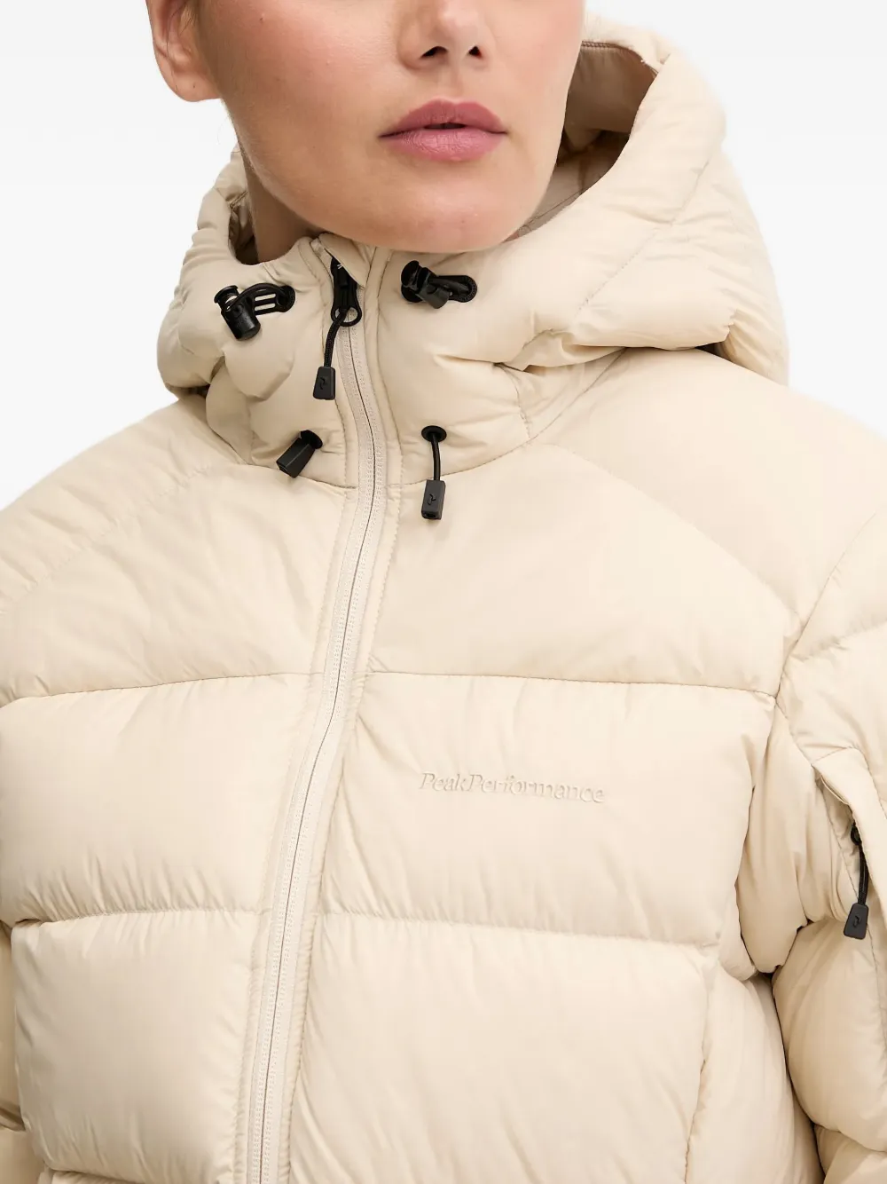 Peak Performance Gewatteerd jack met capuchon Beige
