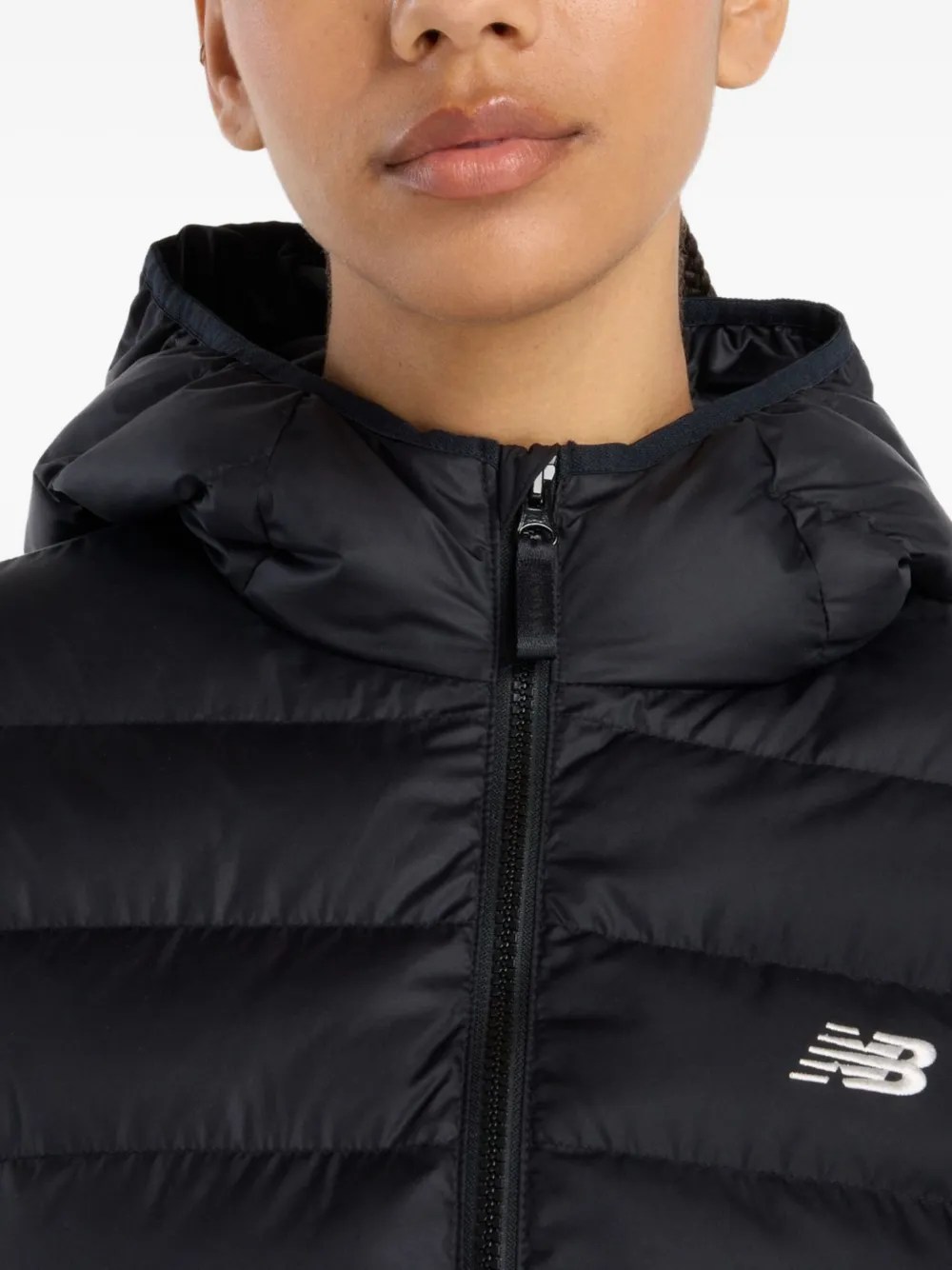 New Balance Sport Essentials donsjack met capuchon Zwart