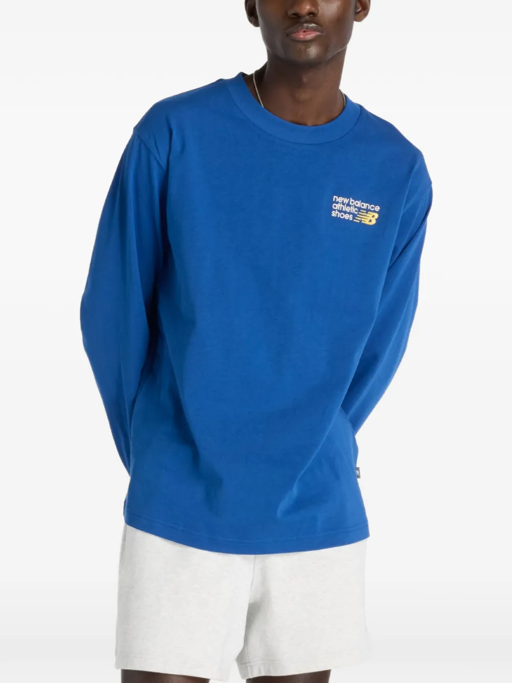 New Balance T-shirt met geborduurd logo Blauw