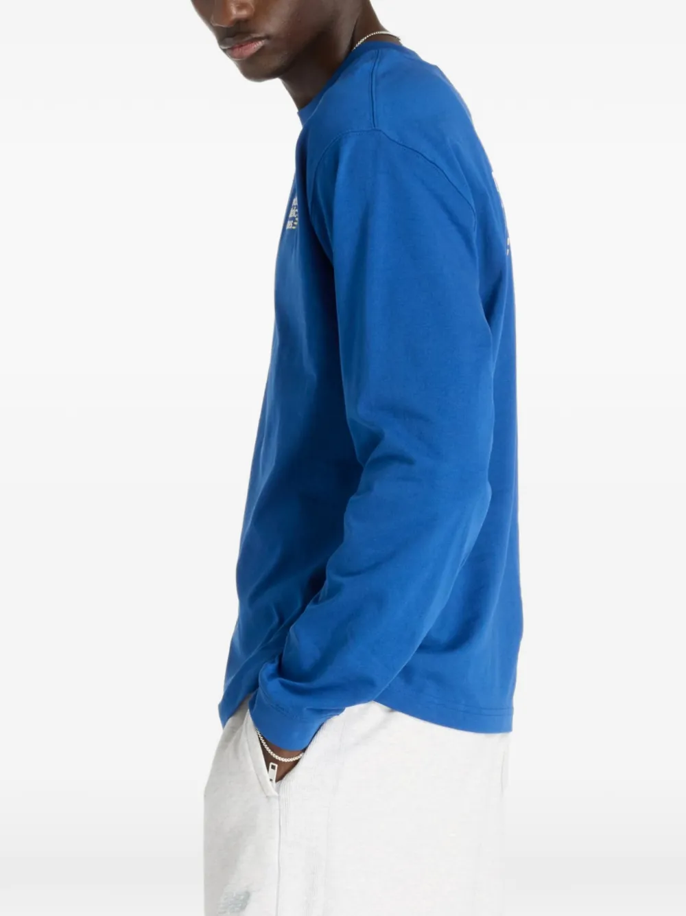 New Balance T-shirt met geborduurd logo Blauw