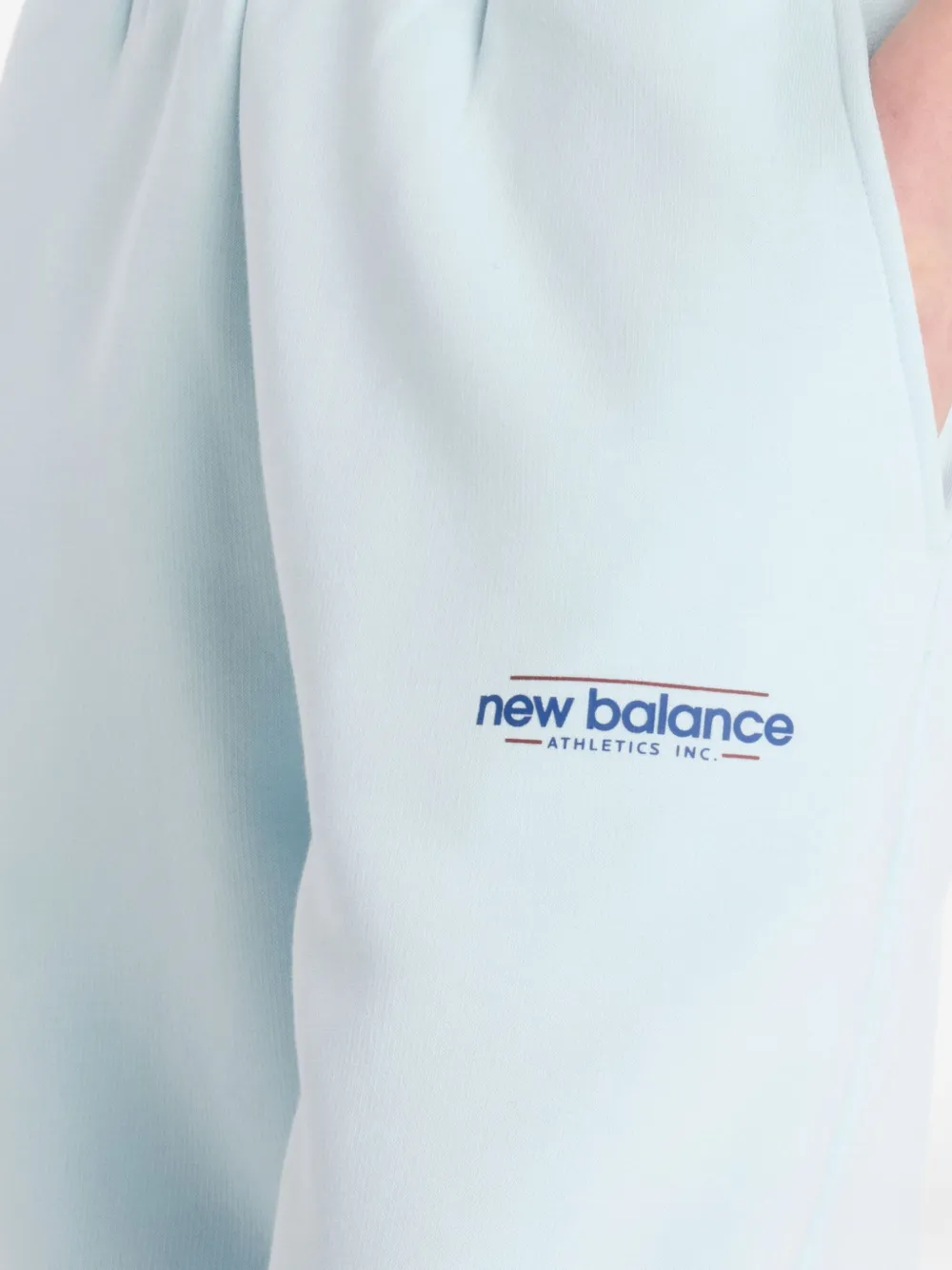 New Balance Broek met toelopende pijpen Blauw