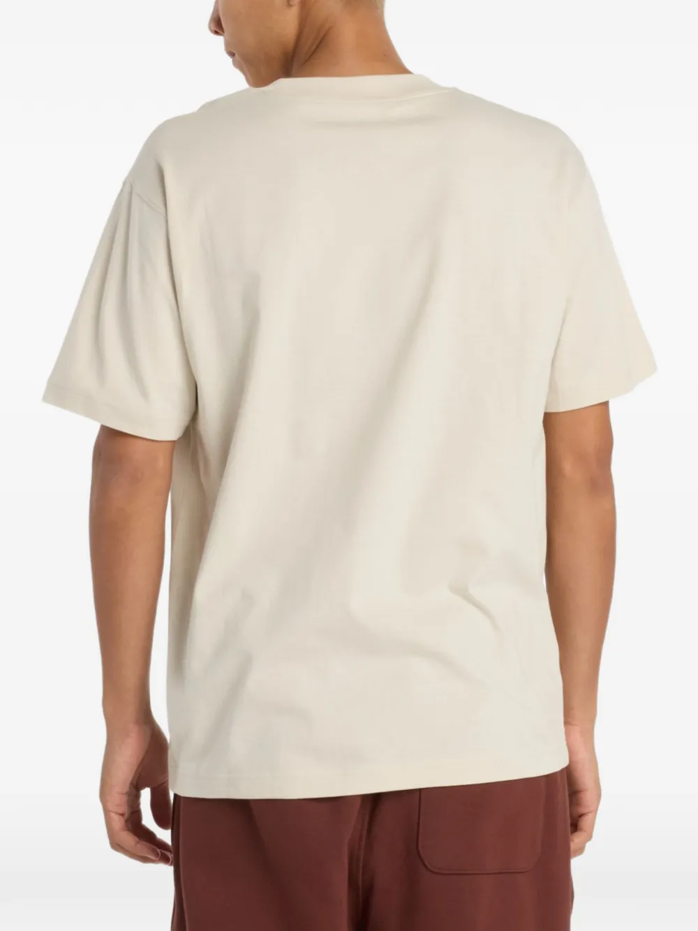 New Balance T-shirt met geborduurd logo Beige