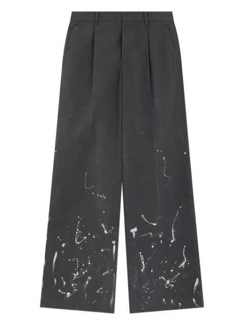 We11done pleated paint-splatter trousers