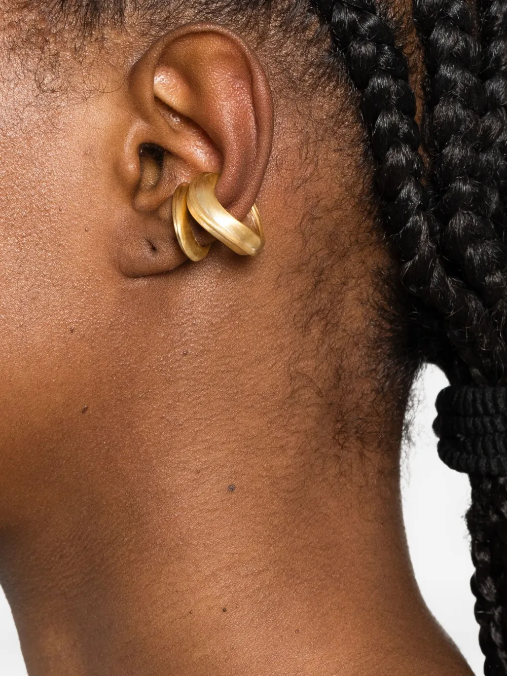 Completedworks Riveting Ear Cuff In Gold