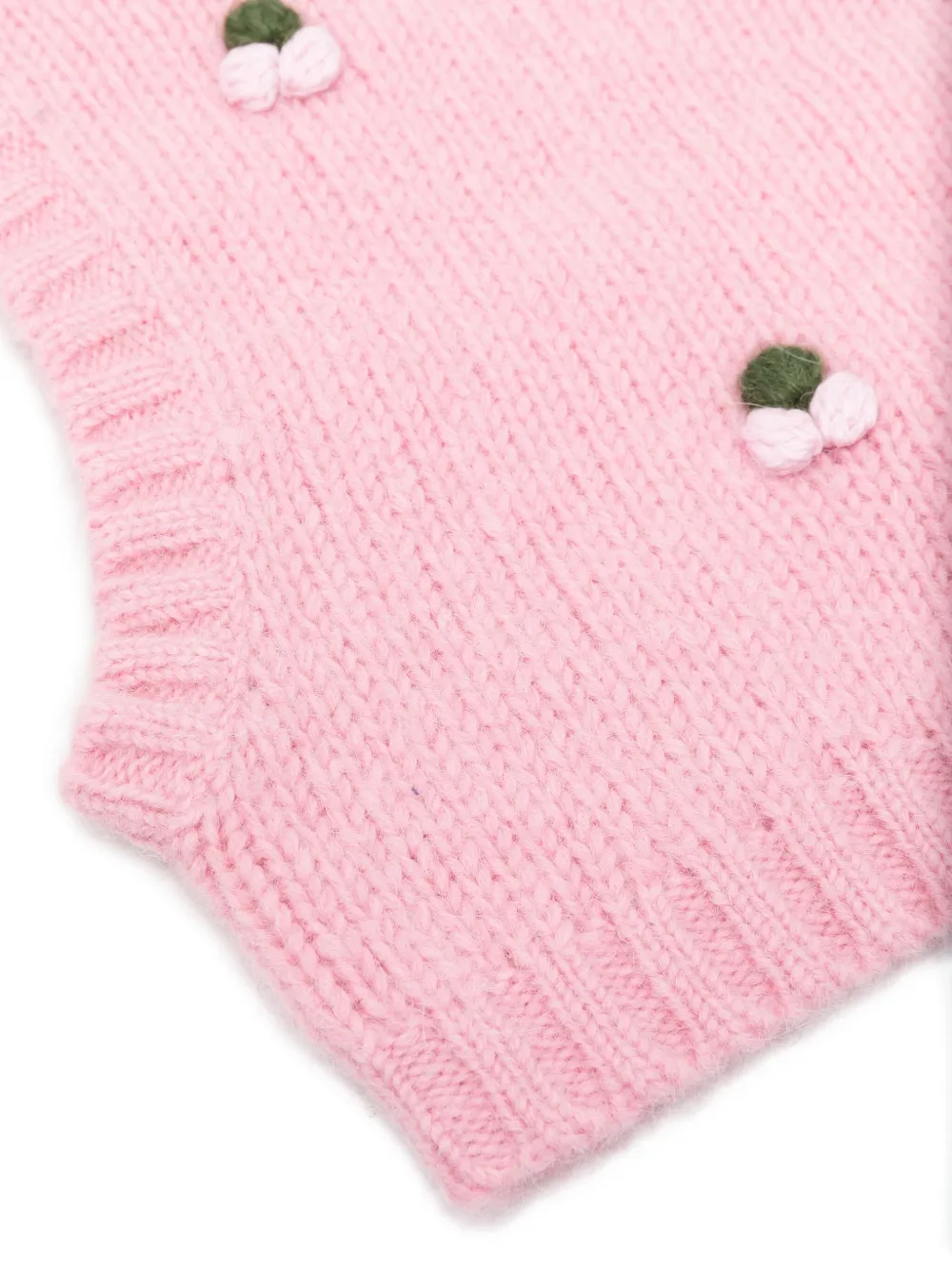 Stine Goya Bivakmuts verfraaid met pompon Roze