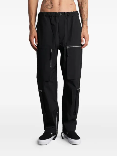 Comme des Garçons Homme pantalones con bolsillos y cierre