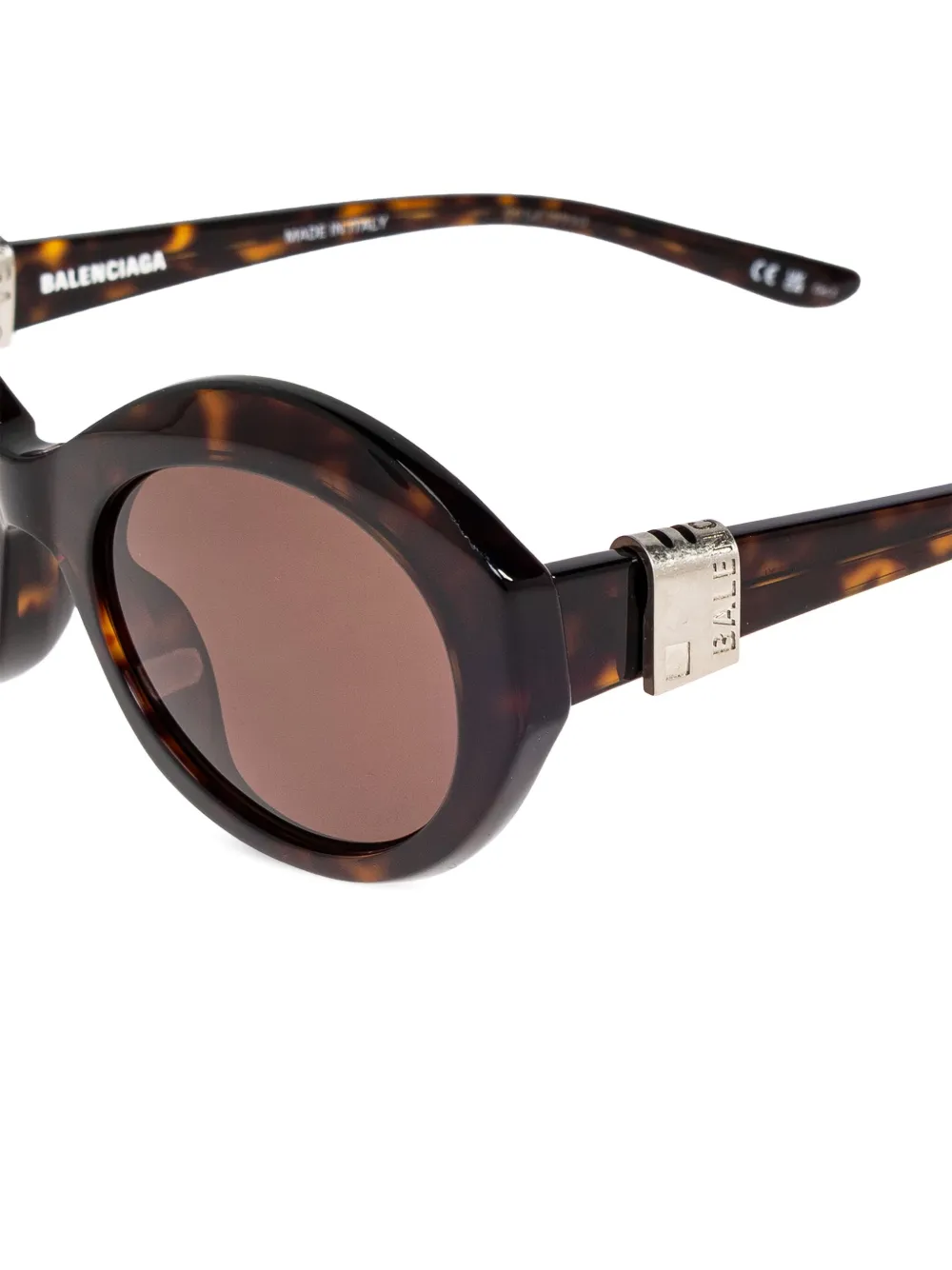 Balenciaga Eyewear Zonnebril met ovalen montuur Bruin