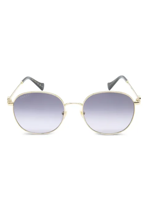 Gucci Pre-Owned lentes de sol con logo y armazón redonda 2020
