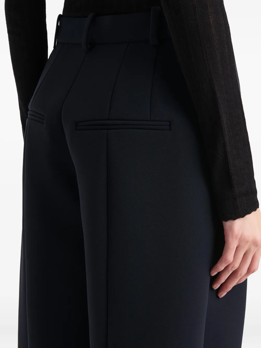 Khaite Button-detail Pleated Trousers In Blue