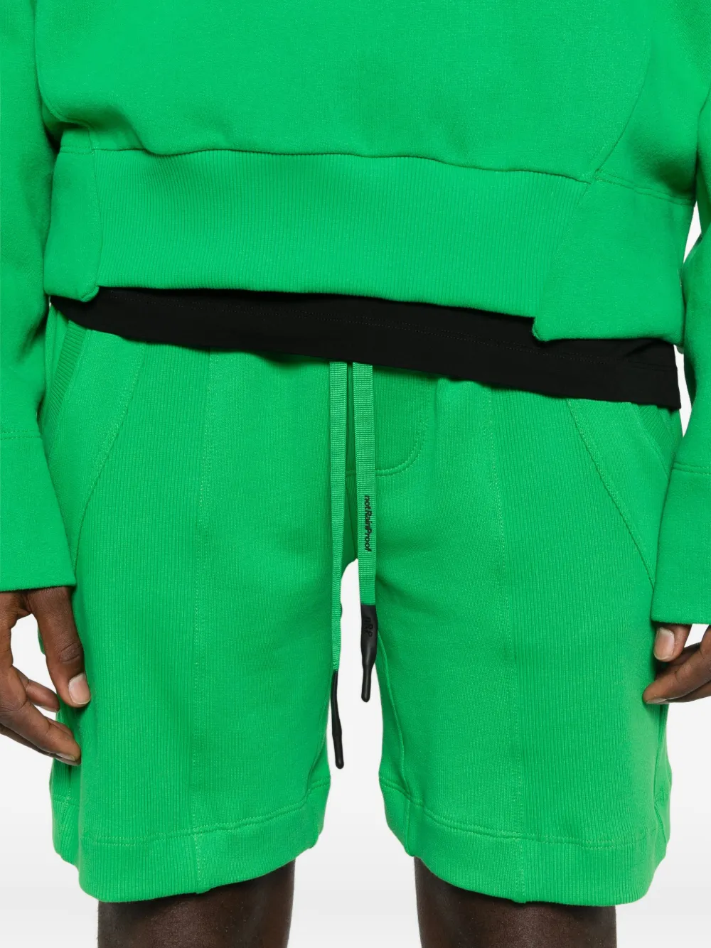 NotRainProof Trainingsshorts met trekkoordtaille Groen