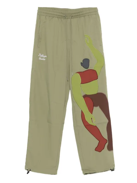 KidSuper motif-appliqué trousers